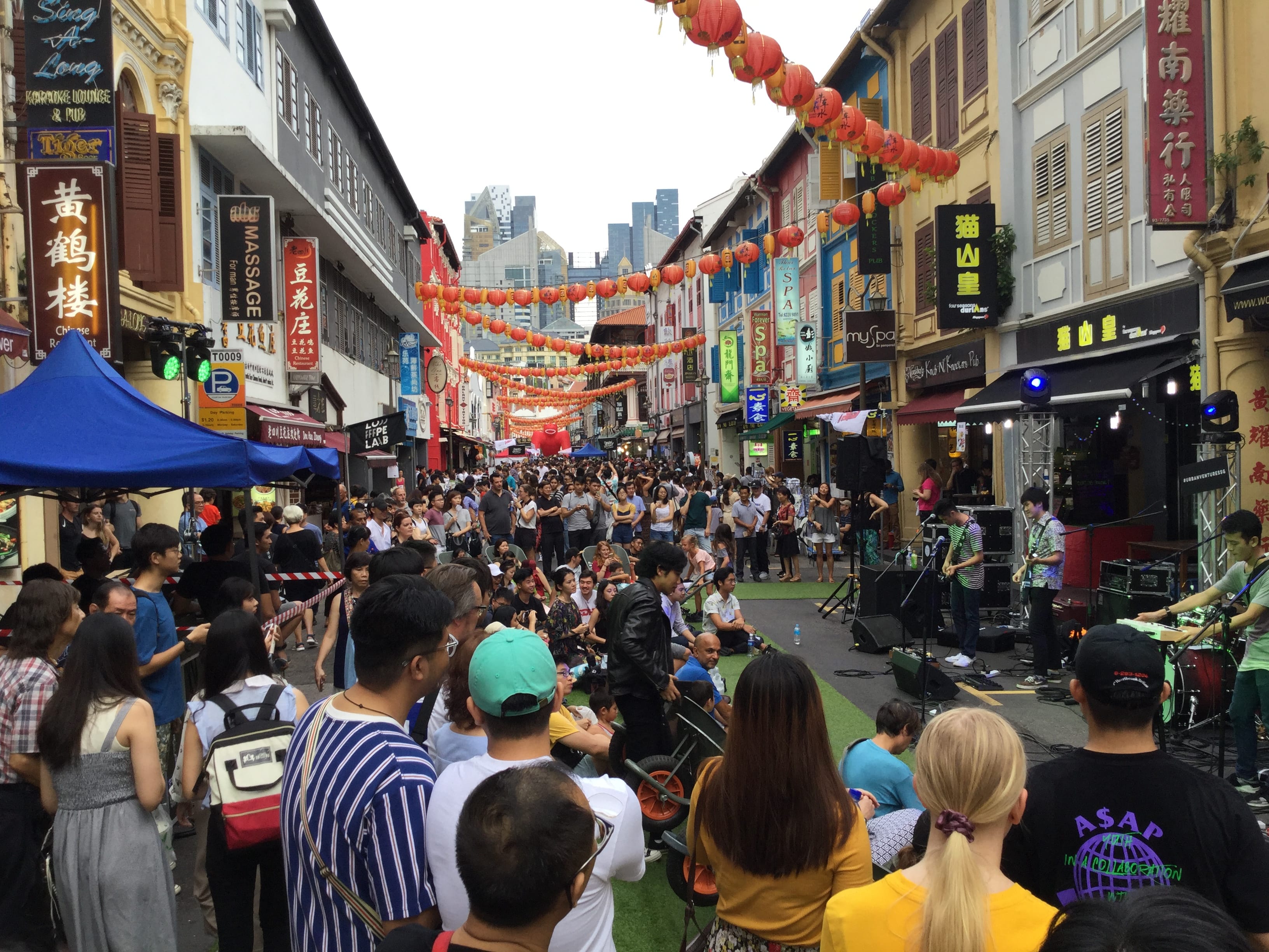 Photo of vibrant activities at road closure at Streets for People
